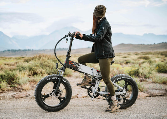 Woman Riding E-Bike in Mountainous Region